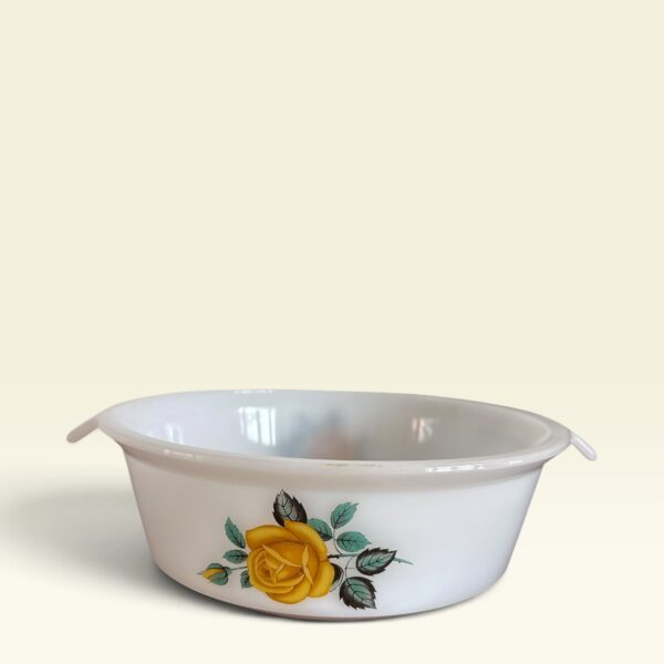 Vintage schaal met 'easy grip' en gele roos